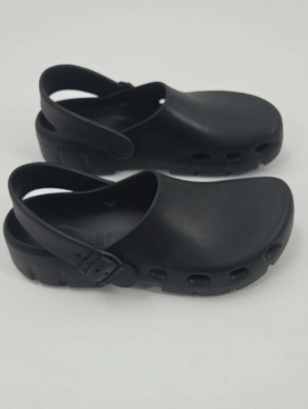 Birkenstock Black Foam Clogs with Heel Strap